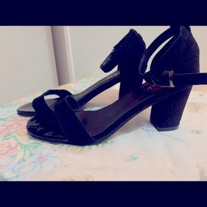 Black strapped heels